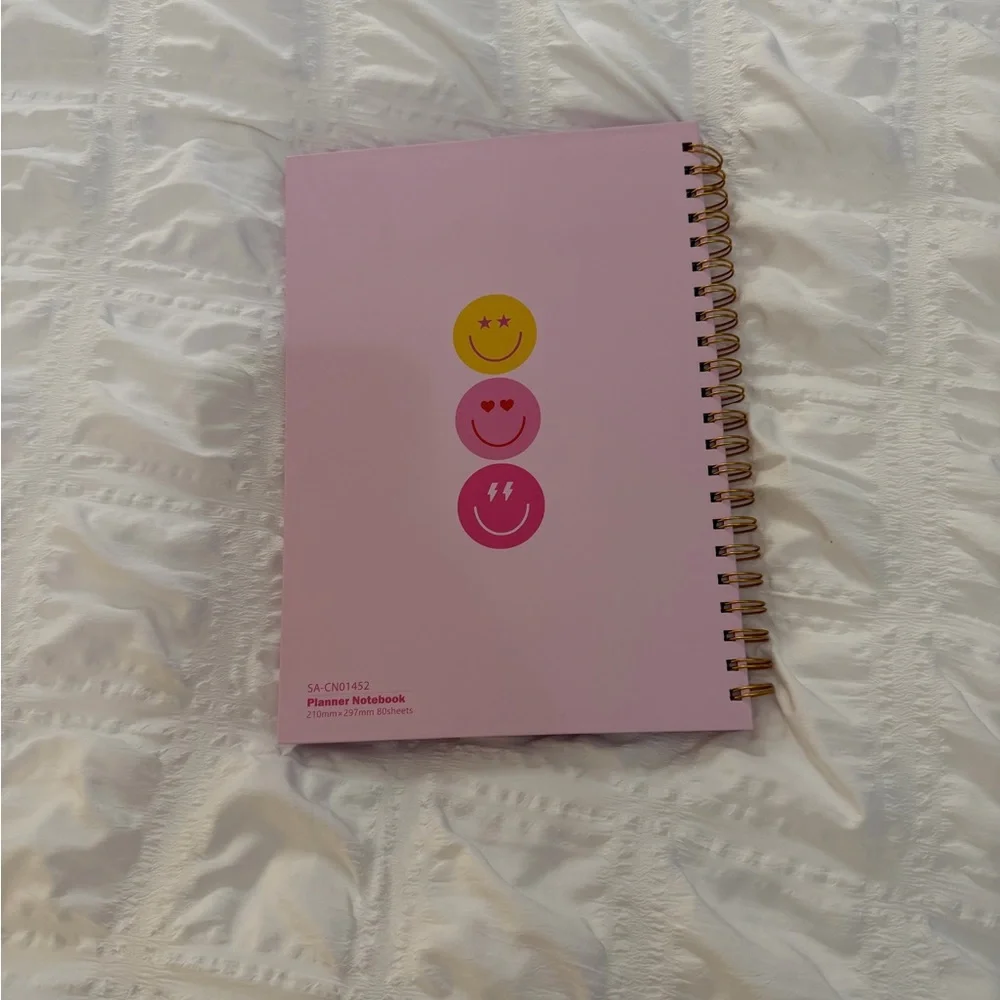 Pink Daily Planner with Smiley Faces